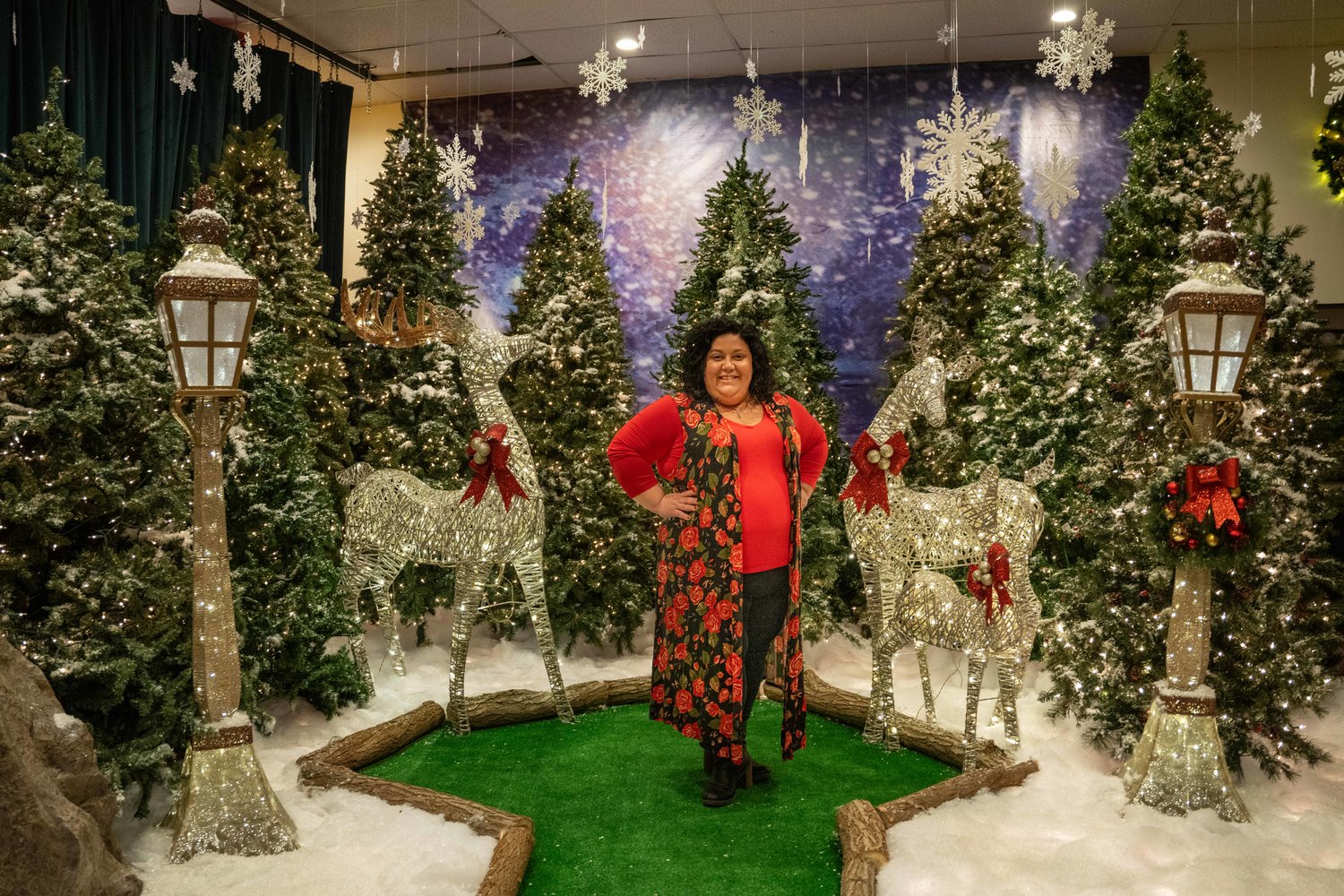 CMPAC executive director Alyse Arpino stands in the middle of a perfect Instagram shot within the Enchanted Reindeer Forest.
